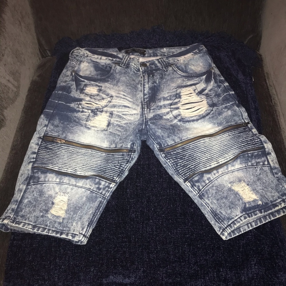 Men’s distressed jean shorts, w/ zippers.
